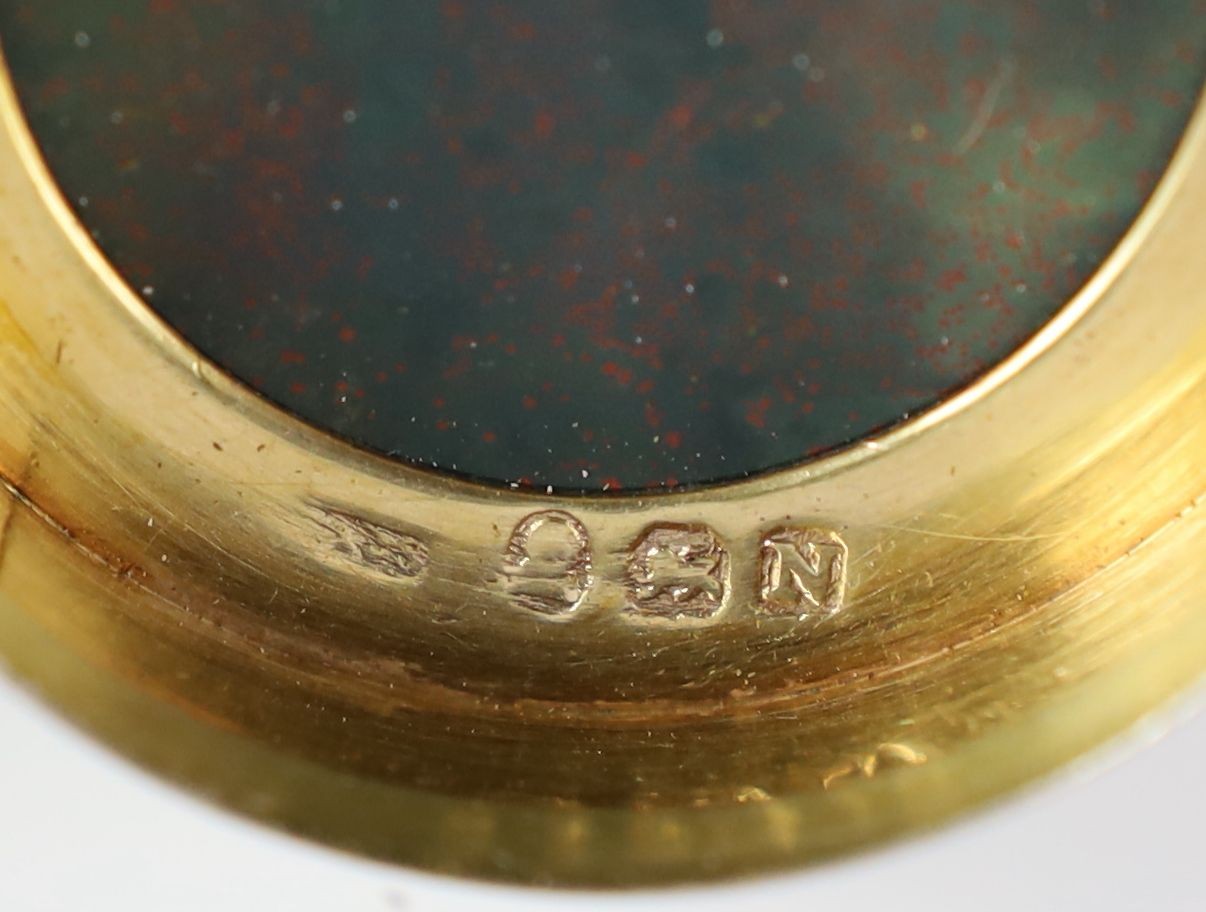 A George III engine turned silver gilt and inset bloodstone circular snuff box and cover, maker's mark rubbed